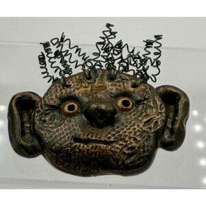 Signed Koza Folk Art Face Brooch Molded Clay Wire Hair Art Jewelry Creepy Alien